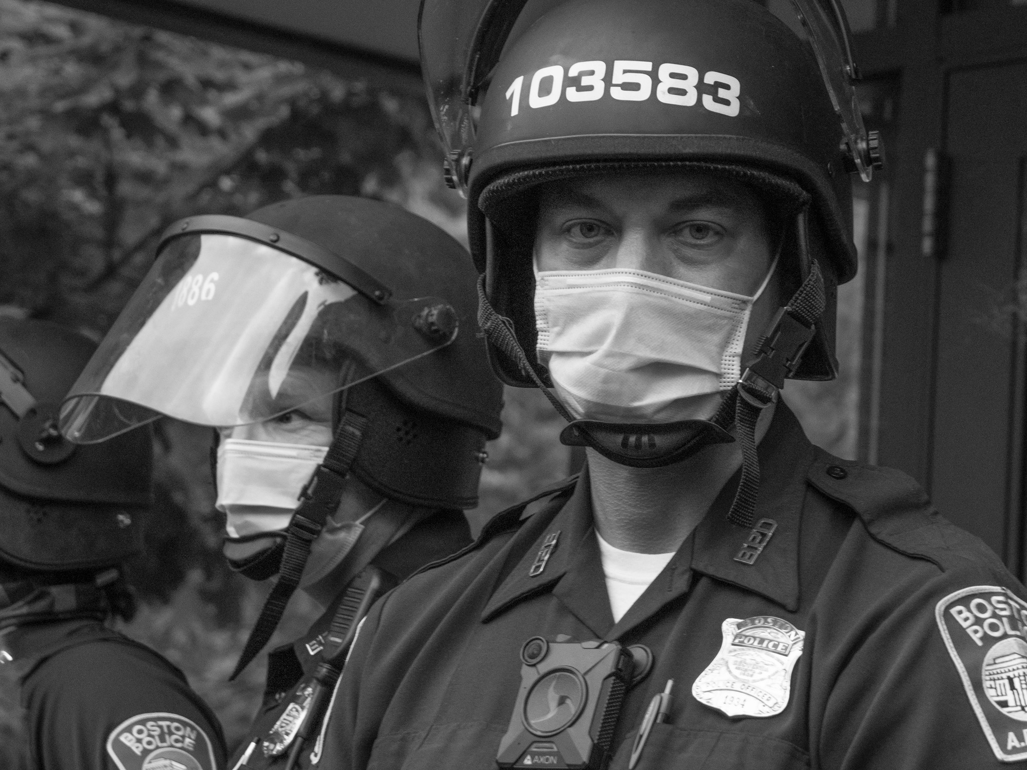 Boston Police officer in riot gear, close portrait