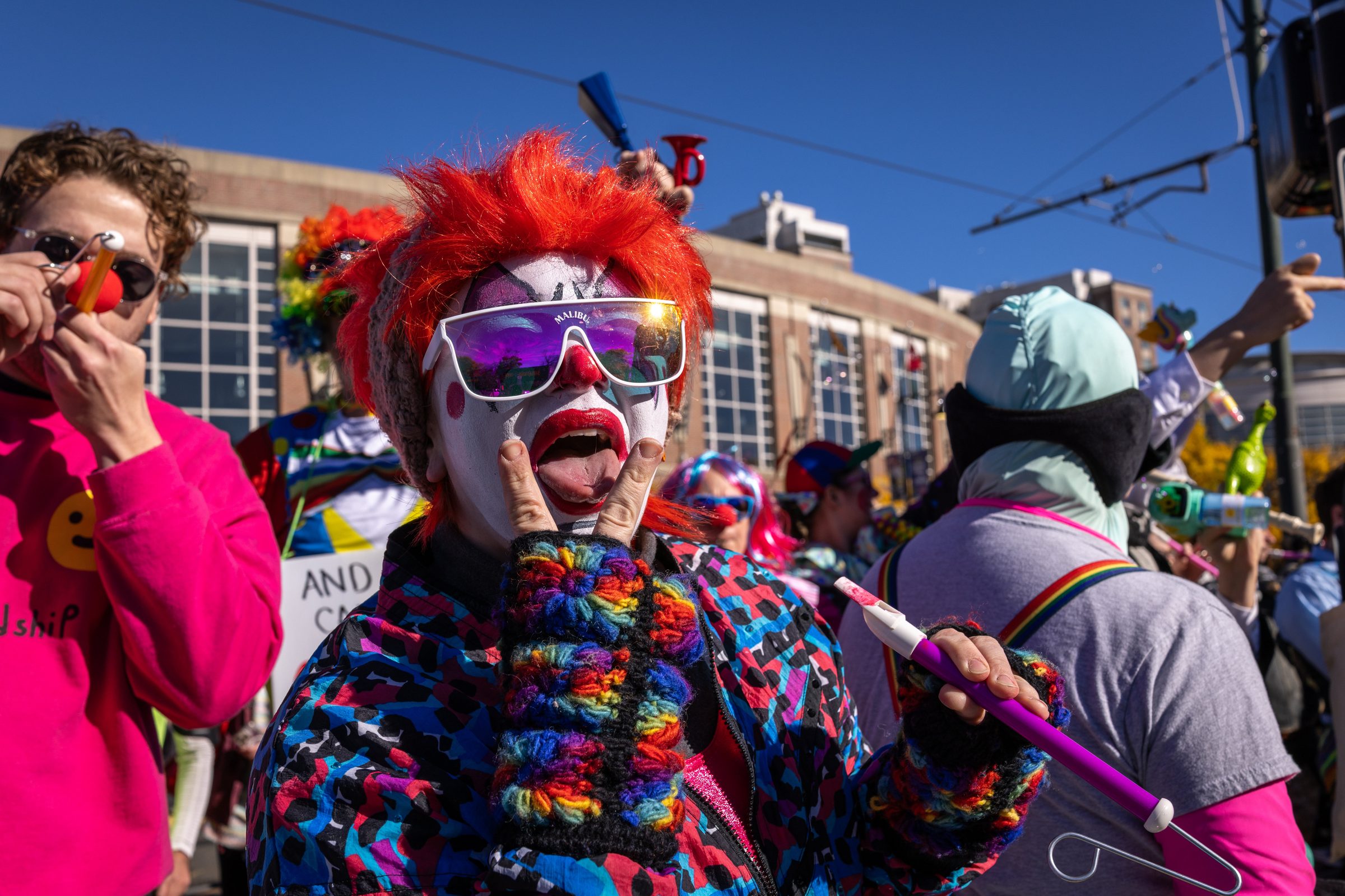 Counter-protester in clown makeup