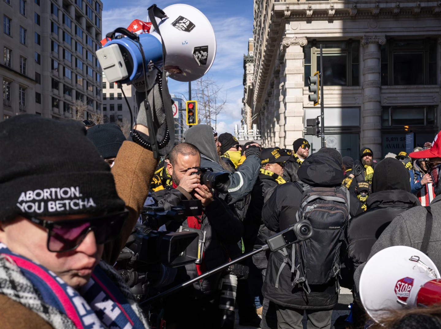Press and protesters in crowd, D.C.