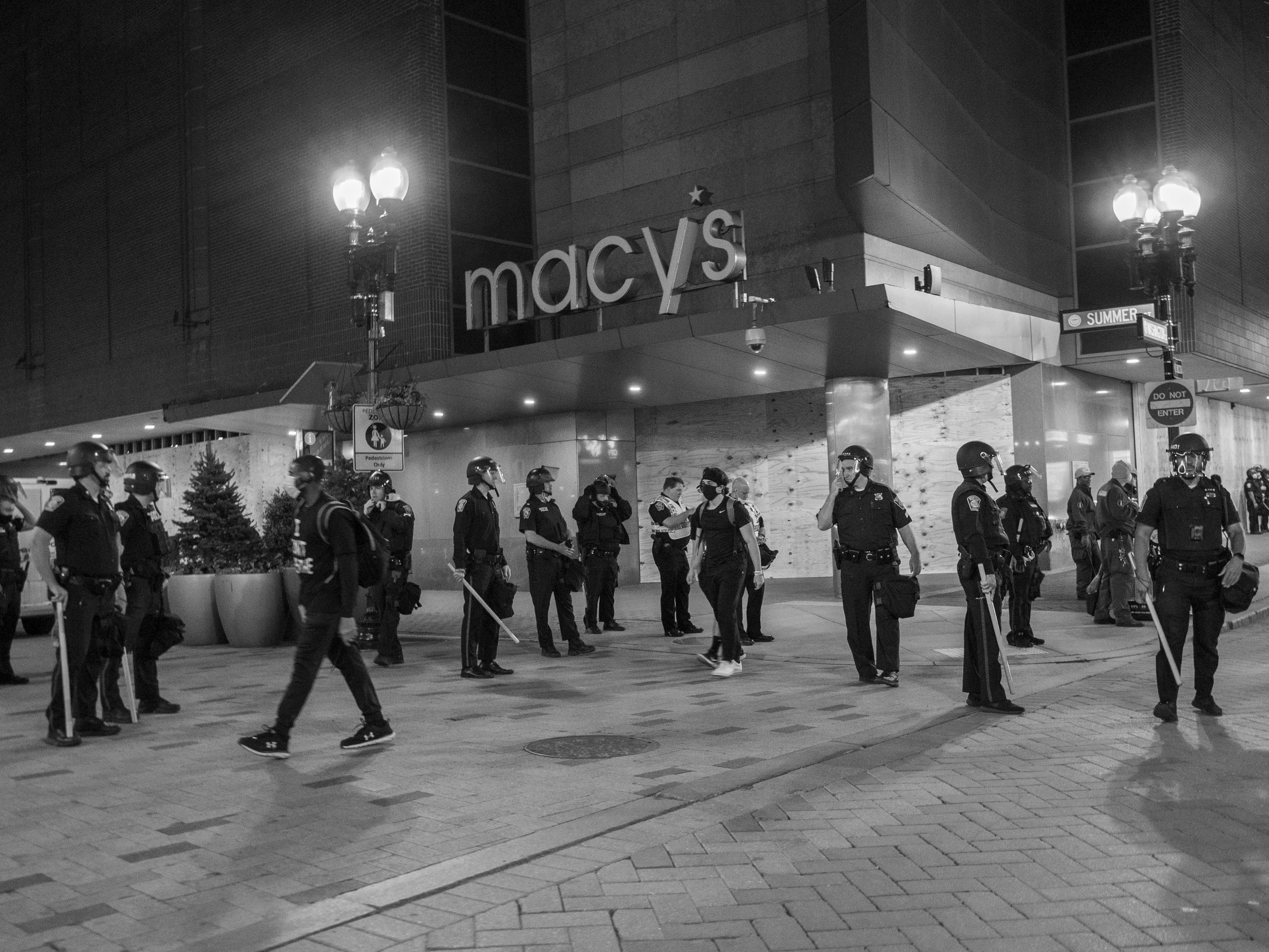 Police line outside Macy's at night