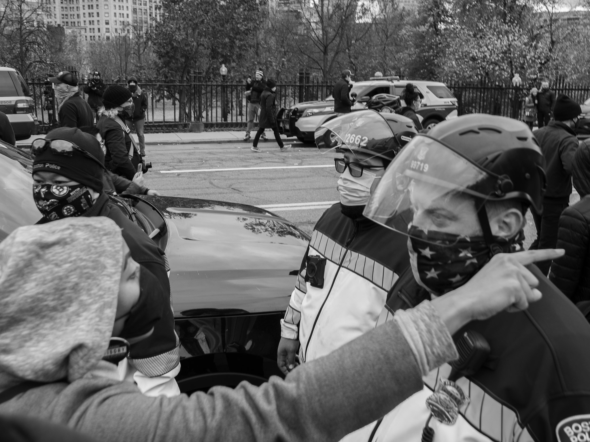 Protester pointing at officer