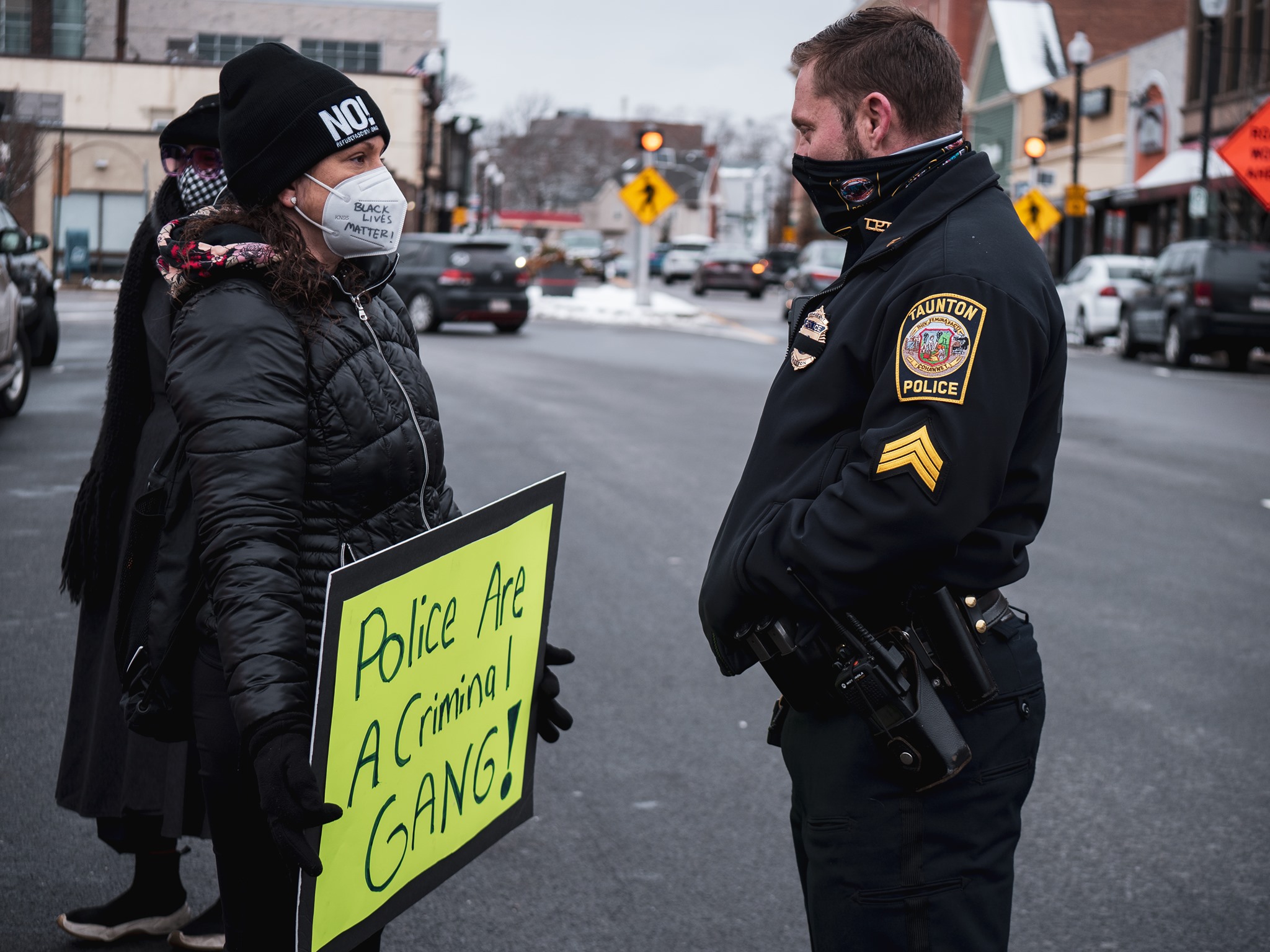 Protester facing Taunton Police sergeant